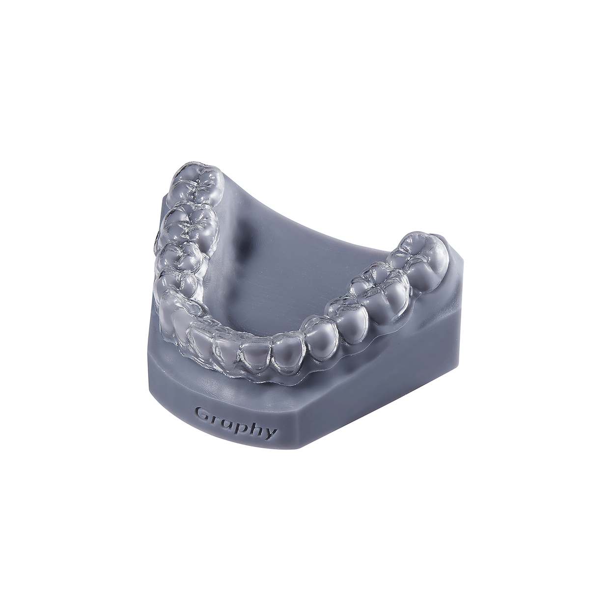 A finished clear Graphy aligner seated on a dental model